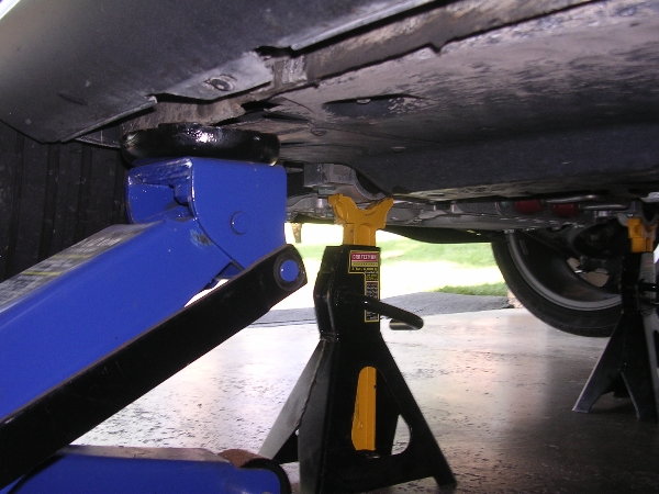 Raise the car and secure it with jack stands