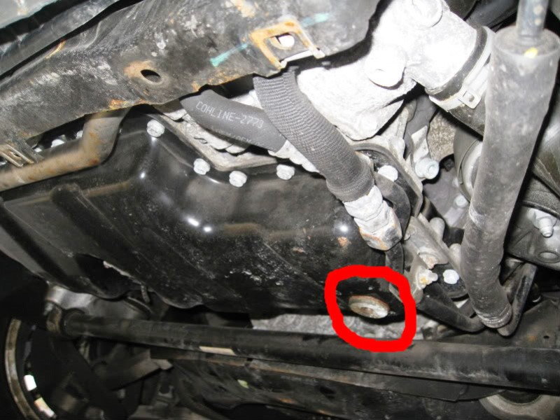 4.2 V8 drain plug is a larger plug on the driver side