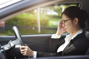 woman stressed in car