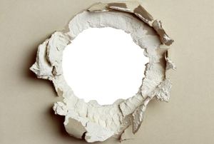 A hole in drywall.
