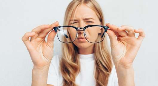 Image of a woman squinting.