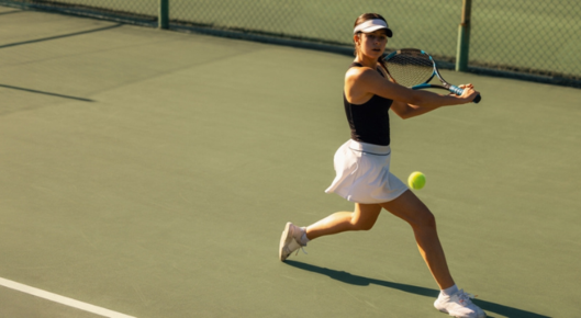 Woman playing tennis.