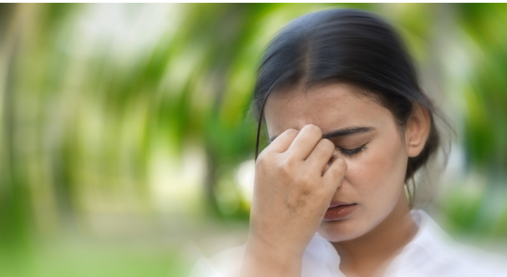 Woman experiences vertigo.