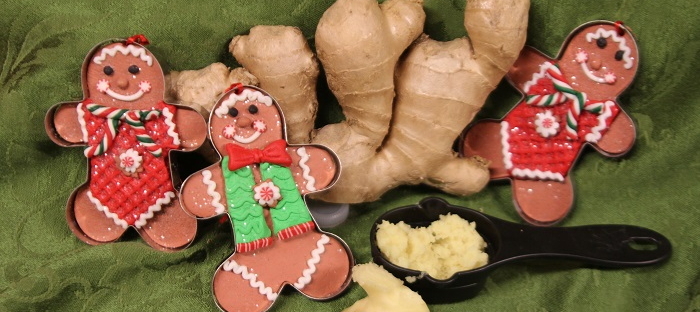 Fresh ginger root with peeled and grated ginger