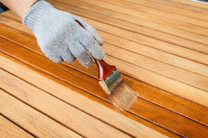 stain your outdoor furniture to protect it from the elements 