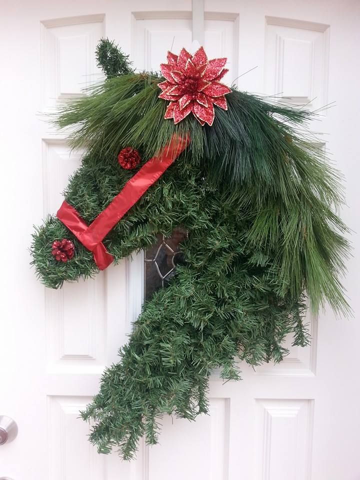 evergreen wreath shaped like a horse's head