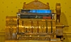 A brass cash register.