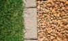 gravel and grass separated by paving stones