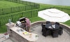 outdoor kitchen, grill, and patio seating