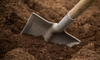 a shovel in the dirt