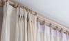 How to Repair the Curtain Track on a Bay Window