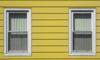 yellow aluminum siding on a house