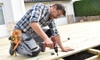 man building deck with screwgun