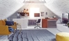 attic apartment with bright window