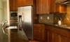 A kitchen with wall cabinets.