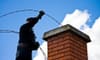 Man cleaning a chimney