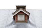 A metal roof with a dormer