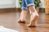 bare feet on hardwood floors