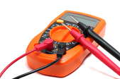An orange, digital ohmmeter with red and black probes.