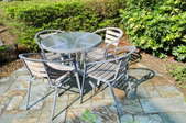 small patio table with four chairs
