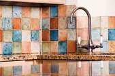 Multi-colored kitchen tile backsplash