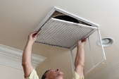 Air conditioner filter installation.
