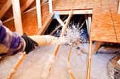 A point-of-view look at installing blown-in attic insulation.