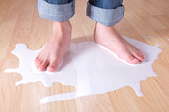 milk spilled on laminate flooring