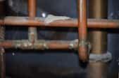 web of copper piping