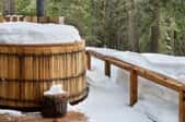 A wooden hot tub in winter.