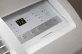 air conditioner with timer and temperature controls