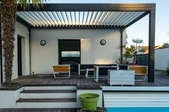 outdoor seating area with modern pergola design