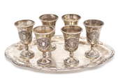 silver plated goblets on tray