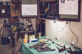 A garage with a workbench and tools. 