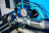 pipes and pressure gauge for water well tank
