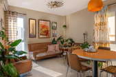 seventies interior design with plants and orange themes