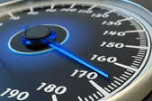 a speedometer reading 165