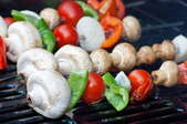 vegetables cooking on a barbecue