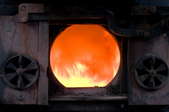 The firebox of a wood burning furnace.