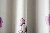 white curtain with purple flower print