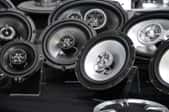Various types of auto speakers are on display