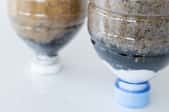 DIY water filters in plastic bottles
