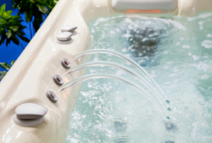 hot tub with fountain of water pouring into it