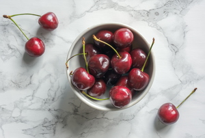 Cherries in a bowl.