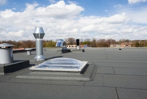A roof covered in roofing membrane.