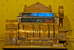 A brass cash register.