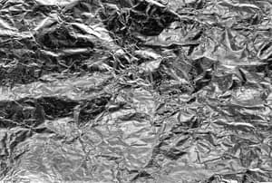 A crumpled aluminum foil background.