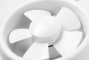 A small, white, plastic exhaust fan.