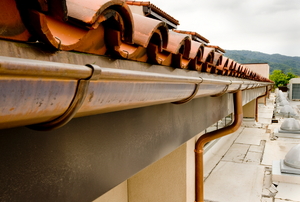 A close-up image of gutters and fasica boards.