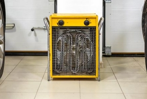 electric heater in a garage between cars
